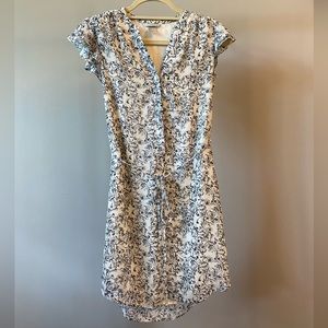 Short sleeve H&M dress. Size 2. Hidden button top. Black & white floral.